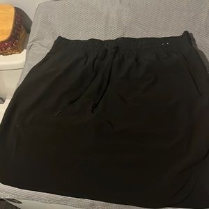 Ladies black golf skort